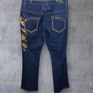 Stylish Women's Blue Jeans with Gold Accents